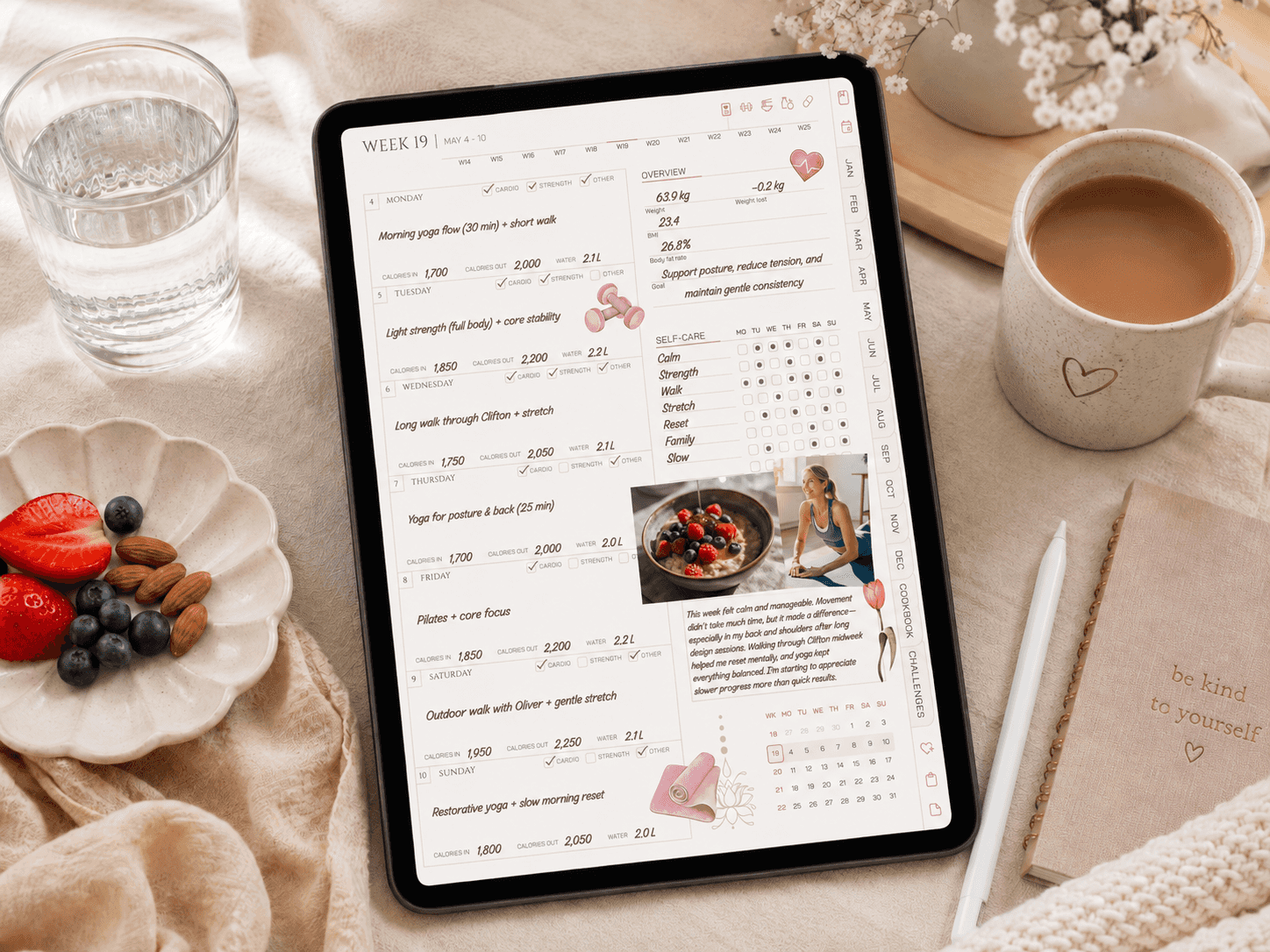iPad fitness planner with daily wellness tracking for movement, meals, water, mood, sleep, and